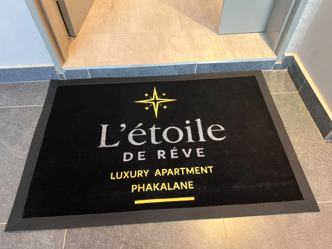 Entrance at L’étoile de Rêve featuring branded welcome mat